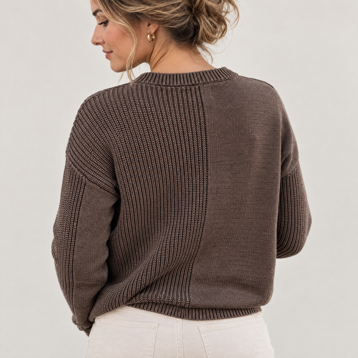 Chocolate mixed knit crew neck pocket sweater worn by a model