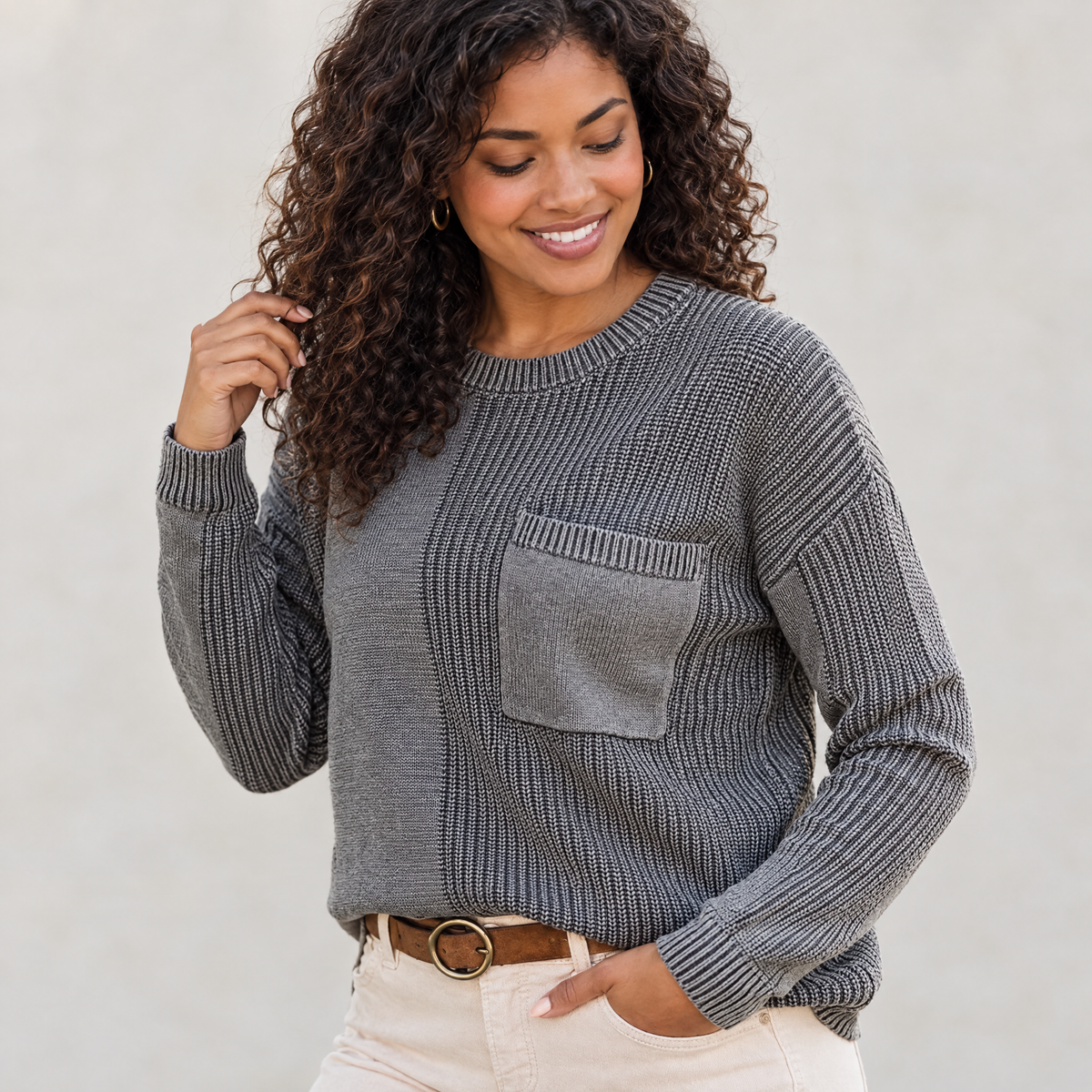 Clay mixed knit crew neck pocket sweater worn by a model