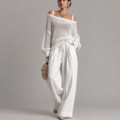 Woman wearing the off-shoulder top and wide leg pants set, front view
