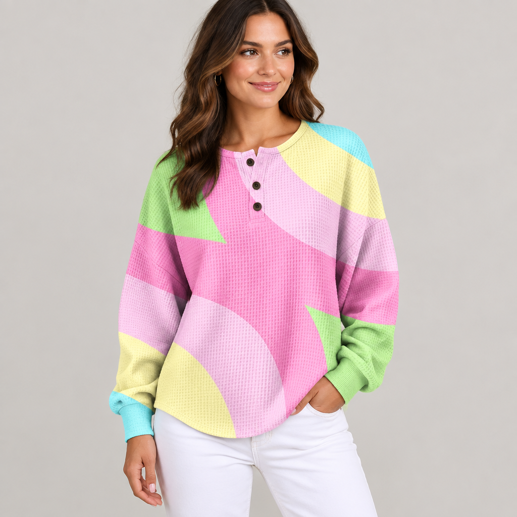 Woman wearing the abstract geometric henley sweater, front view