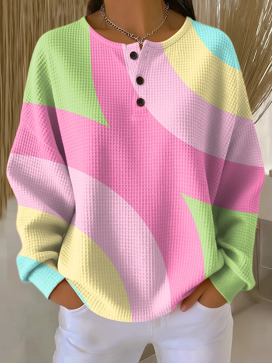 Abstract geometric henley sweater
