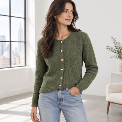 Woman wearing the Skyler Cable Knit Button Cardigan