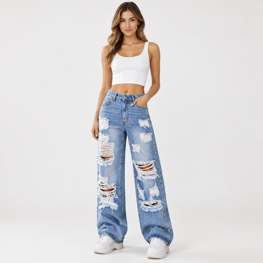 Model wearing Skyler Distressed High-Rise Wide Leg Jeans