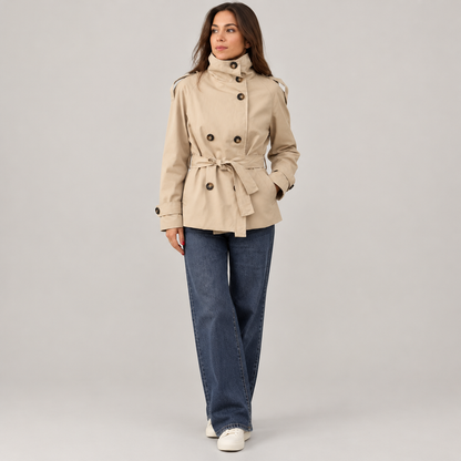 Skyler Double-Breasted Belted Trench Coat in Beige worn by a model
