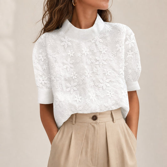 Women's white stand collar blouse with tonal floral embroidery and elbow-length sleeves