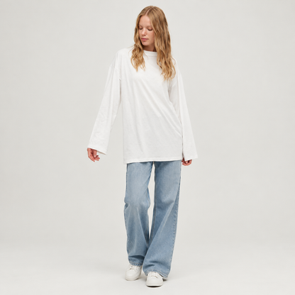 Skyler Oversized Long Sleeve Cotton Tunic Top in Ecru worn by a model