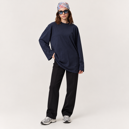 Skyler Oversized Long Sleeve Cotton Tunic Top in Navy Blue worn by a model