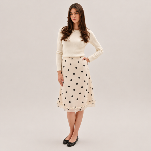 Skyler Polka Dot Ruffle Midi Skirt worn by a model