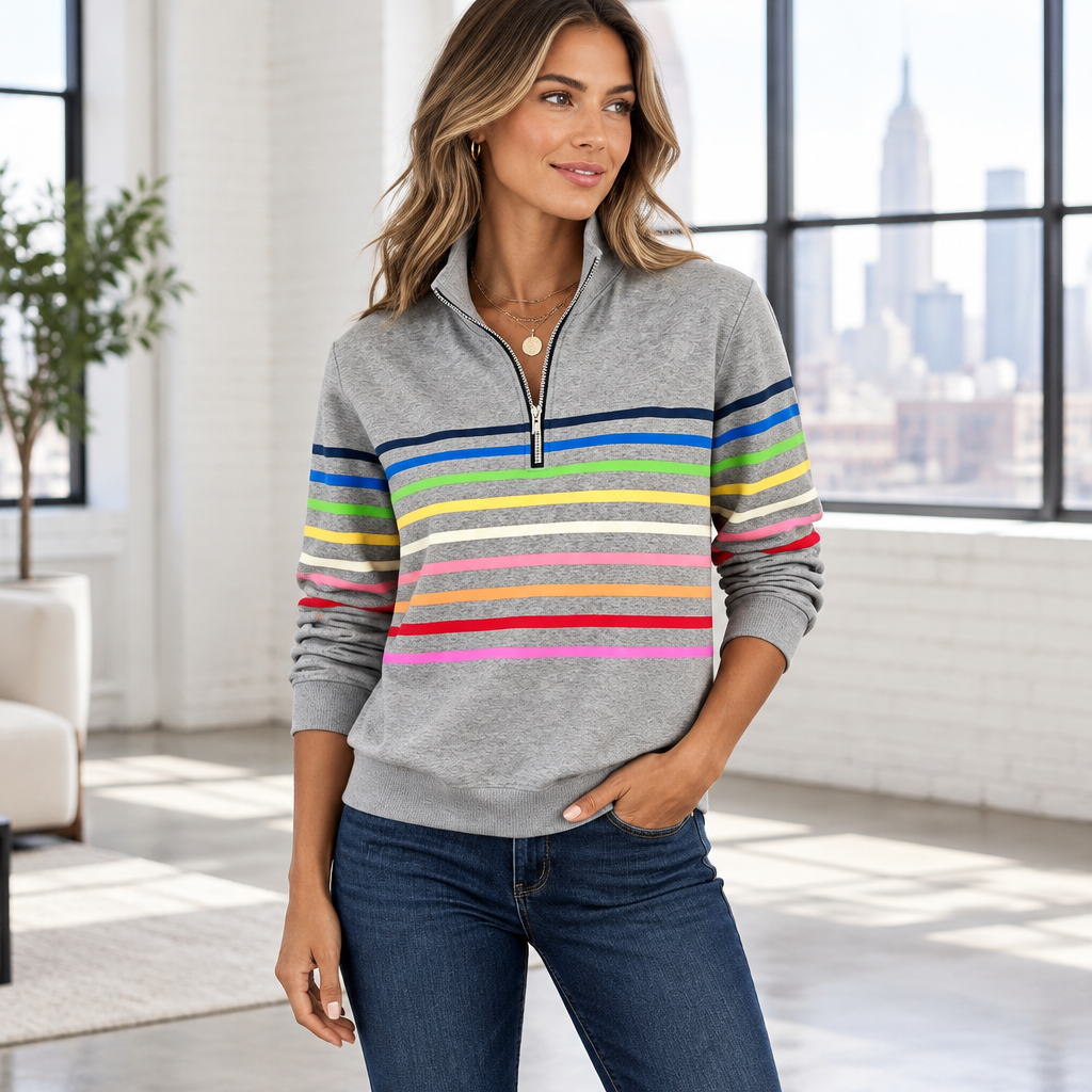 Woman wearing the Skyler Rainbow Striped Half-Zip Sweatshirt