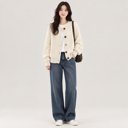 Woman wearing the Relaxed Cable Knit Cardigan