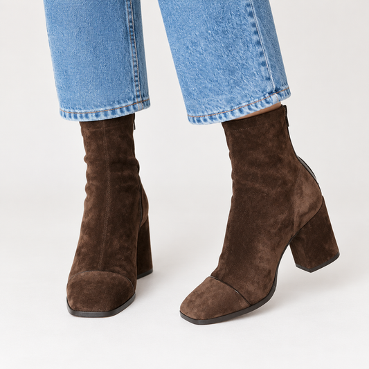 Woman wearing Skyler Suede Block Heel Ankle Boots