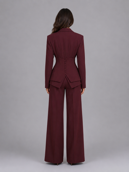 Women's two-piece pant suit with cinched waist blazer and wide-leg trousers